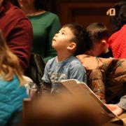 A child during the 9am Holy Eucharist at Trinity Church