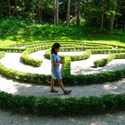 A woman walks the labyrinth at Trinity Retreat Center