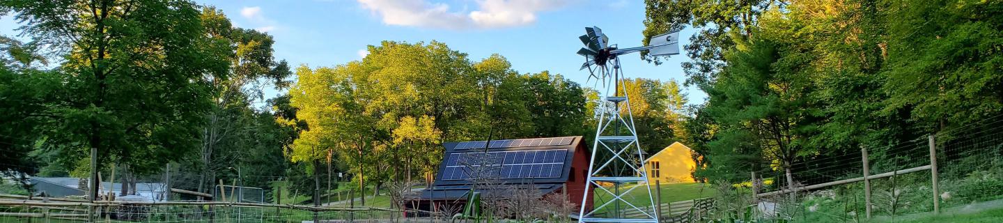 Corn field, Barn with solar panels and a windmill